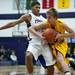 Pioneer senior Duane Simpson-Redmond makes contact as he defends Saline junior Erik Jacobsen on Friday, Feb. 1. Daniel Brenner I AnnArbor.com